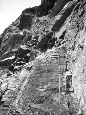 The Land of Rock Climbing Legends. Heinz Kahl leading the last pitch on the first ascent of Red Shirt in 1962.