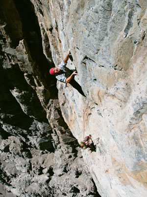 Trad Climbing - Modern Mixed Trad Style. Sonnie Trotter redpointing the crux pitch of The Mistress (5.13), Mt. Yammuska, Alberta