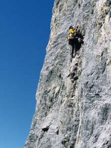 A climber on Jimmy and the Cruzers 5.10c, Mount Yamnuska