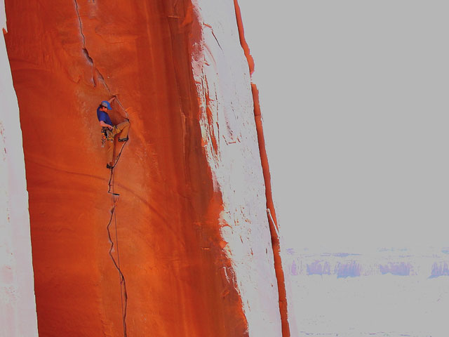First Place: An unnamed climber on Annunaki 5.12a, Optimator Wall, Indian Creek. Photo by Ross Suchy