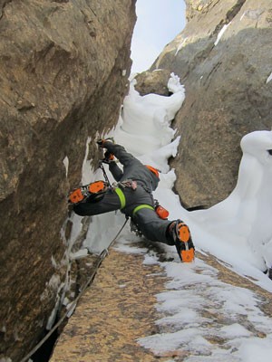 Climbing Big Alpine Routes in the Canadian Rockies. Josh Wharton on the A3 pitch (now M7) of the Wild Thing 