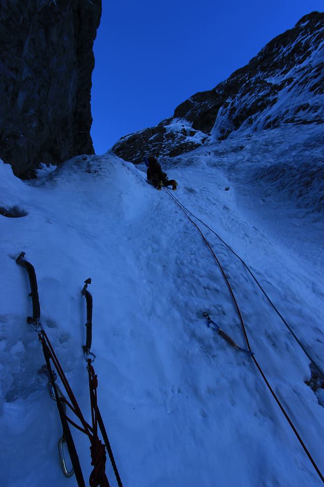 "After cruising up the lower snow field we slowed down and belayed 3 pitches of ice that felt like WI3+/WI4...here's Mike leading the second pitch."  Photo Hunter Lee 