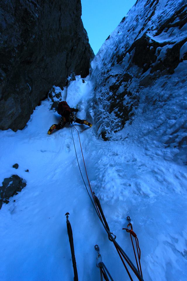 "The upper crux section of the route required 10+ pitches of climbing. I think we would have simul-climbed a few of them if we: weren't feeling the effects of such a long climb, and had visibility, as a significant portion was climbed at night." Photo Hunter Lee