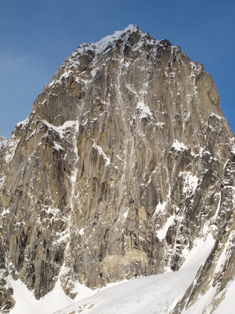 The 1,200 m west face of Pyramid Peak. The obvious line on the left was the main objective of the Canadian Team Photo Clint Helander