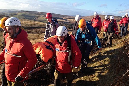 Jonny Dawes being carried away after his fall Photo Edale MRT