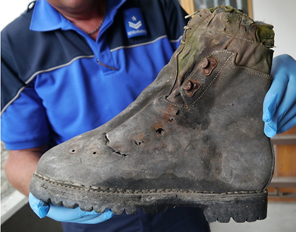 The Swiss police displayed a shoe found with the remains of two Japanese climbers who disappeared from the Matterhorn in the Alps in 1970. Credit Agence France-Presse — Getty Images