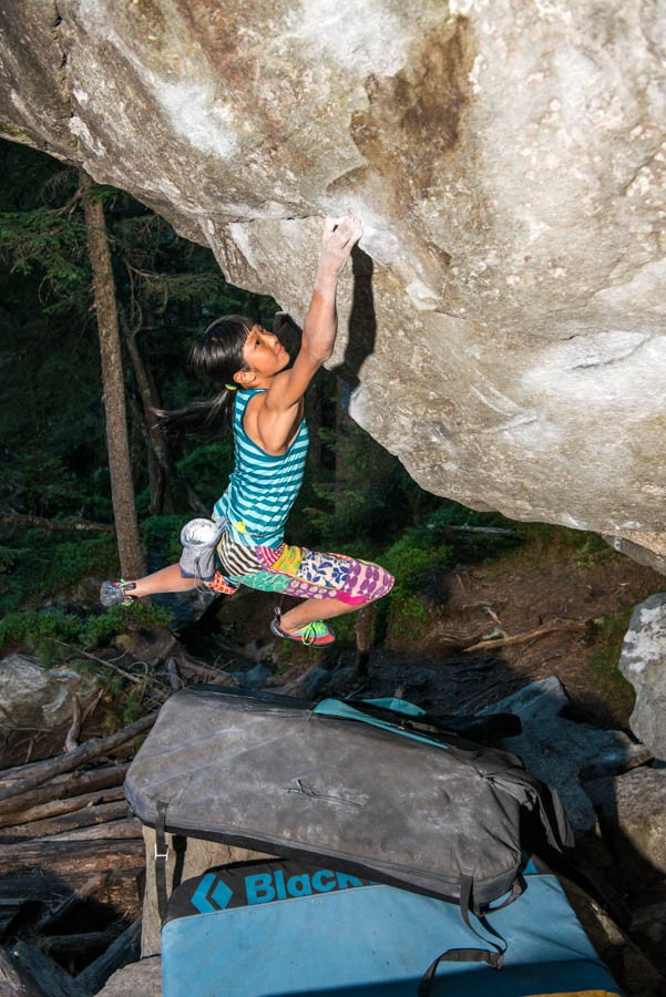 Ashima bouldering in Magic Wood. Photo by Rainer Eder.
