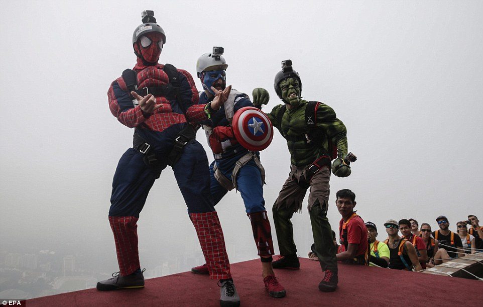 Cameron Minni (Hulk) and friends dressed as super heroes. Photo Getty