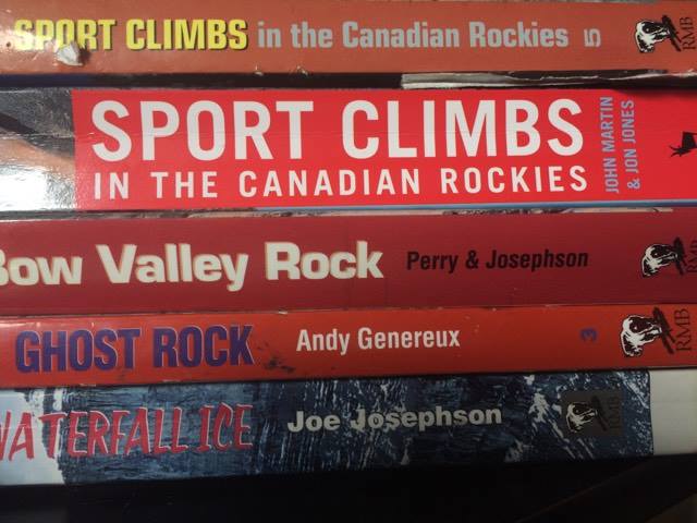 Some of Rocky Mountain Books' guidebooks with the new sport climbing guide.