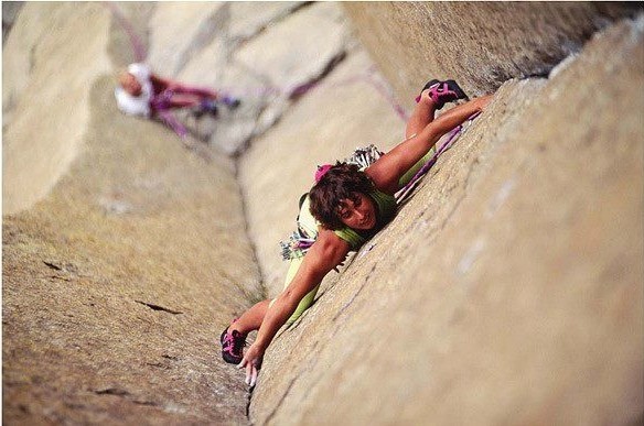 Catherine Destivelle on the hip-stretching El Matador on Devil's Tower. Strong and flexible hips are a must for hard stemming routes.  Photo Catherine Destivelle Collection