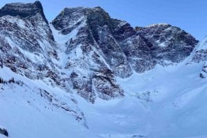 Large mountain highlighting the steep slope of the Gold Card Couloir