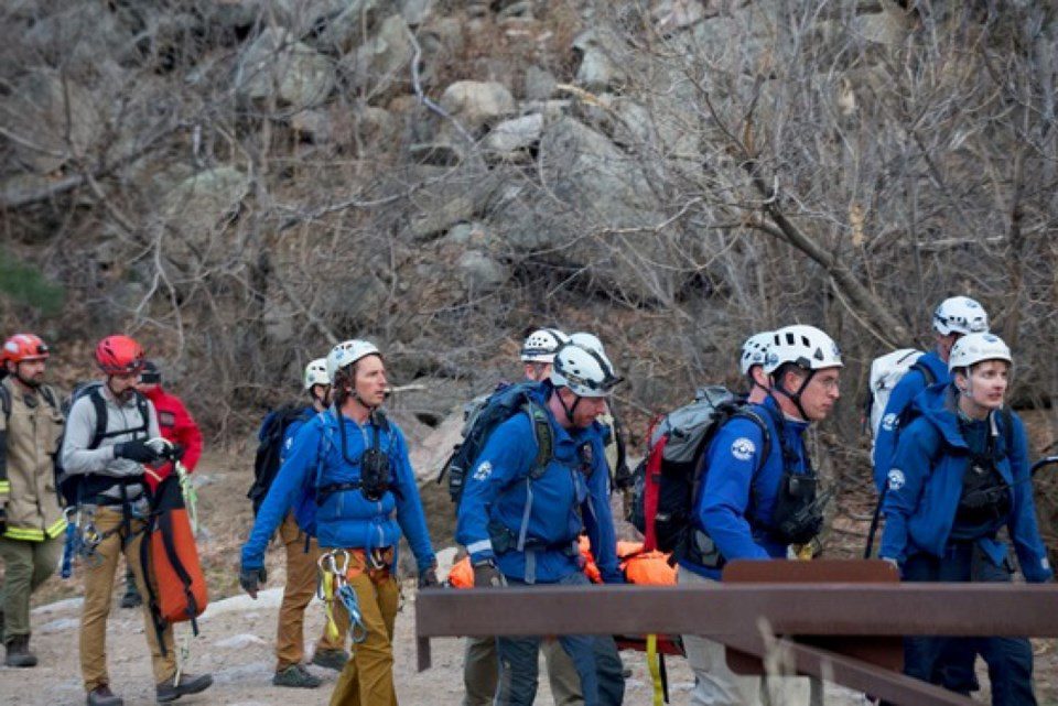 Rescuers from Four Mile Fire, Sunshine Fire, and Rocky Mountain Rescue Group